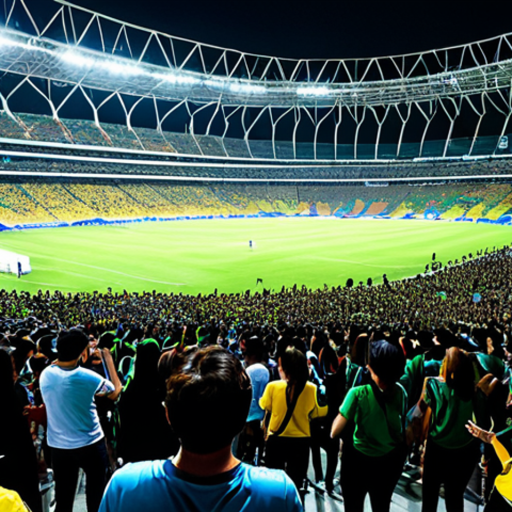 브라질의 한류 콘서트 반응 - **Brazilian K-Pop Fan Experience:** A large crowd of fully clothed Brazilian fans holding lightstick...